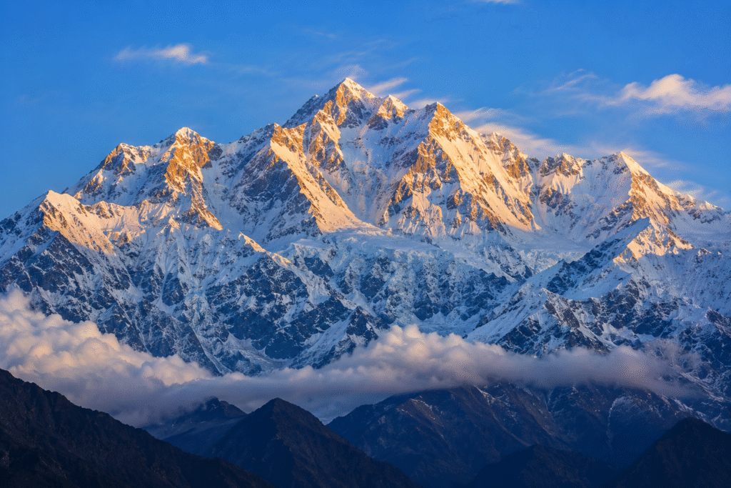 Kangchenjunga, the third-highest mountain in the world, rising above the snow-covered Himalayas at sunrise