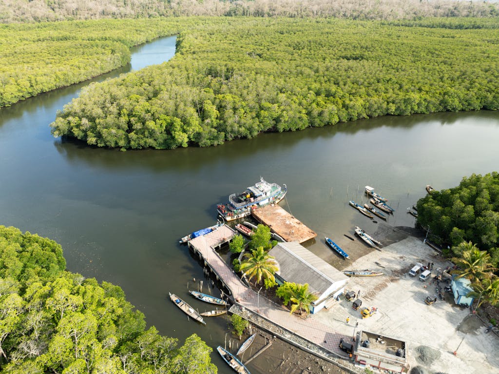 A stunning aerial view capturing the serene Yeratta Jetty surrounded by lush greenery in Andaman Islands, India.