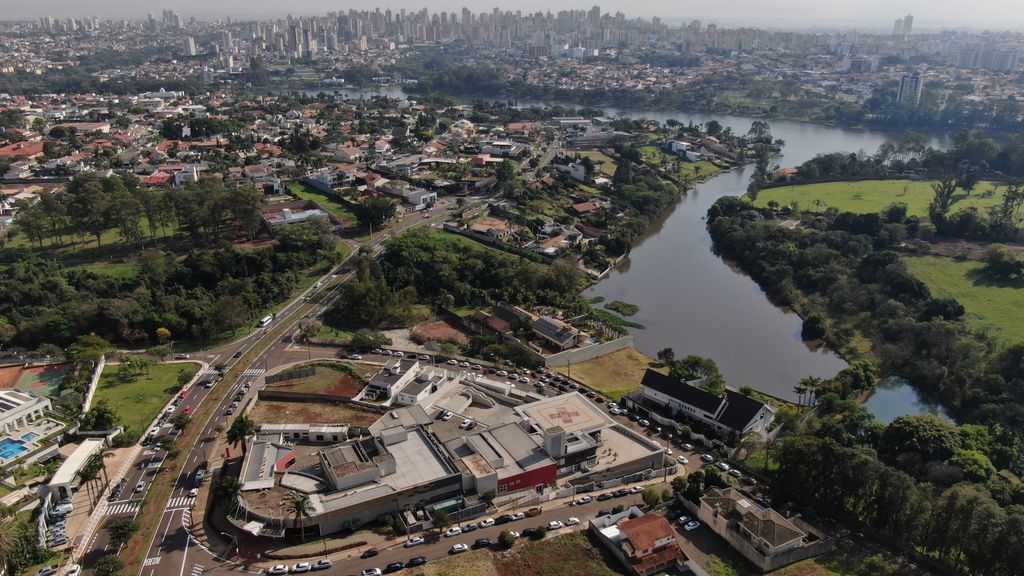 Aerial landscape of Bela Suíça, PR, showcasing urban and natural features.