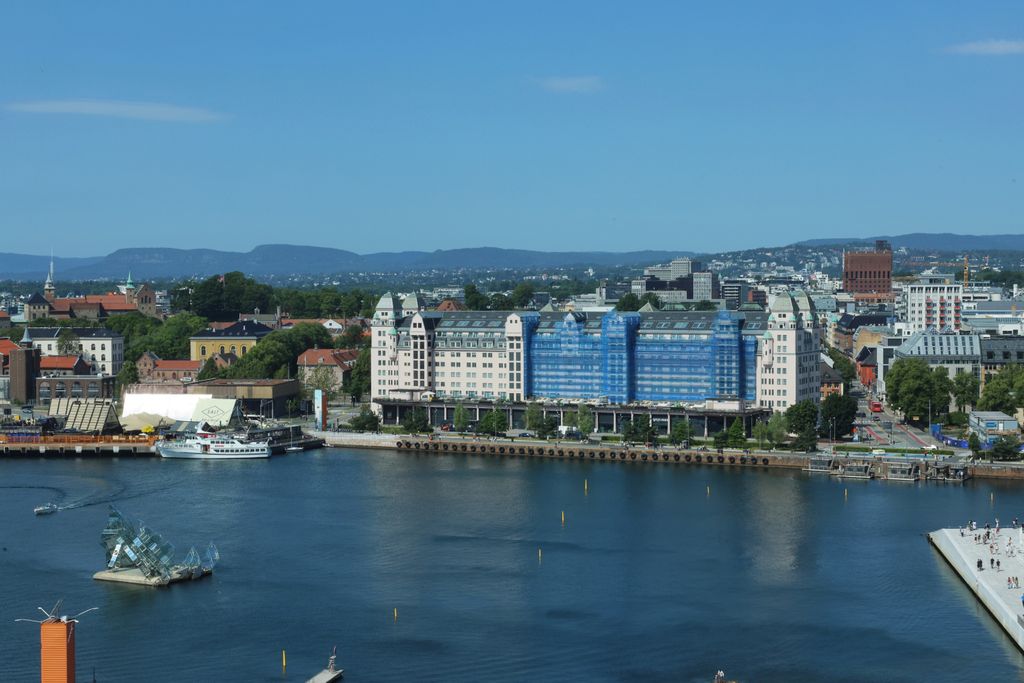 Stunning aerial view of Oslo's waterfront showcasing modern architecture and urban landscape.