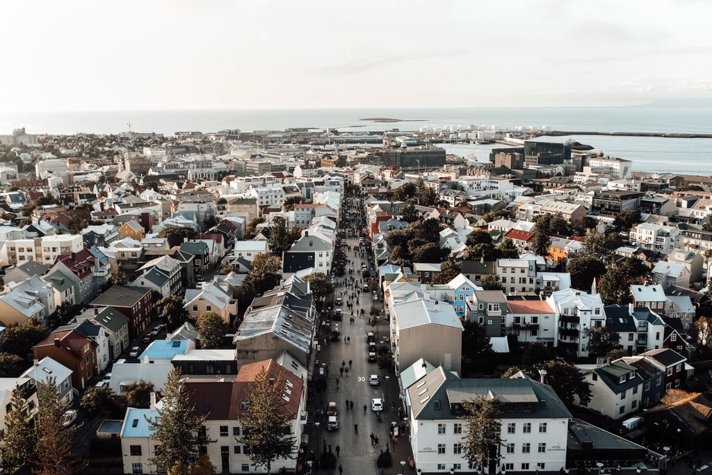 Top 10 Cleanest Cities of the Worlds. Stunning aerial view of Reykjavík showcasing colorful houses and the bustling urban landscape.